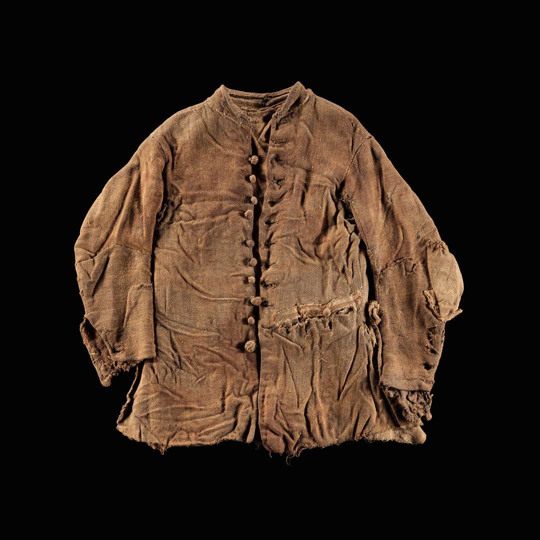 A jacket found with the man is too delicate to go on show (National Museums Scotland/PA)